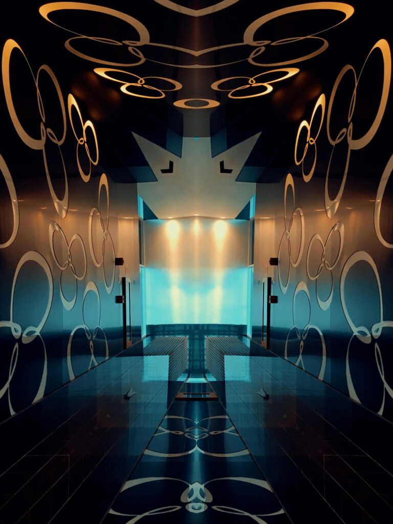 A contemporary abstract design reflecting circles and lights in a modern interior space.